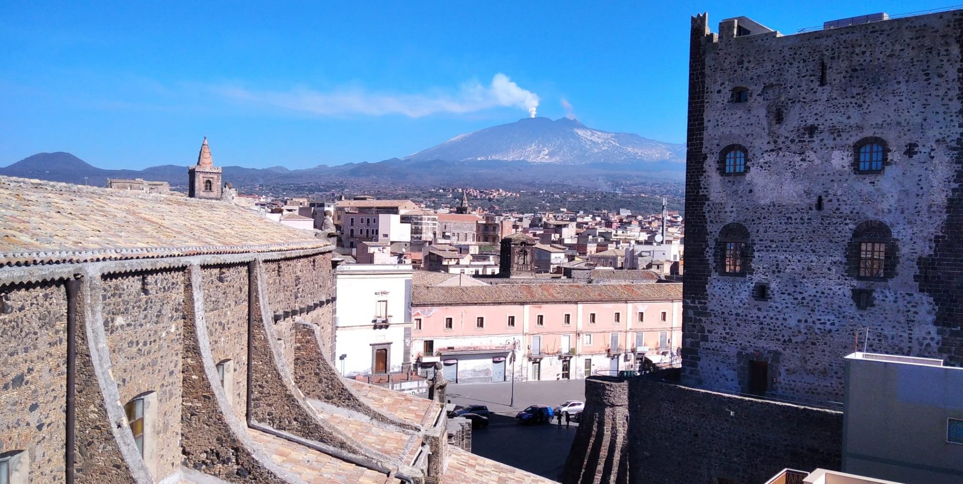 ADRANO. L'ETNA FUMANTE VISTA DAL TERRAZZO DELLA CHIESA MADRE: STORIA